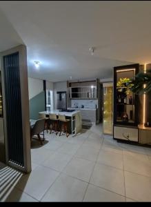 Apto com Churrasqueira, Cama Ortopedica e ar Condicionado 300m da praia