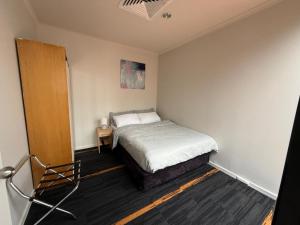 Central Melbourne 2BR Balcony Apartment