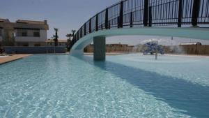 Pool view apartment with private enclosed garden