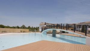 Pool view apartment with private enclosed garden