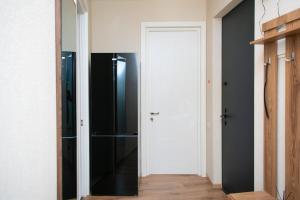 Cozy Georgian-style 1BR in Axis Towers