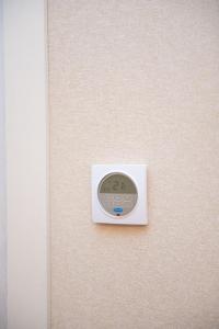 Cozy Georgian-style 1BR in Axis Towers