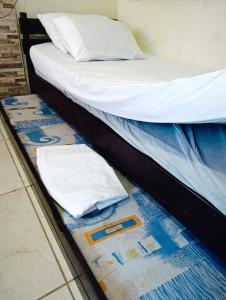 kitnet family - 2 quadras da praia da Enseada