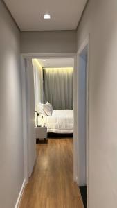 Apto 711 - Elegância com vista parcial da Praia