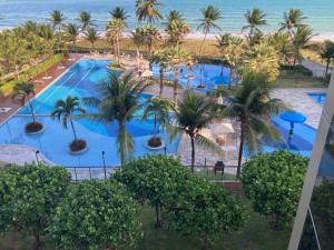 Apto 4q2s pé na areia acomoda até 7