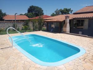 Casa com Piscina e 2 Cachoeiras