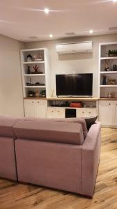 Casa aconchegante 5 minutos da praia a pé Cozy house 5 minutes from the beach on foot