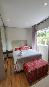 Casa aconchegante 5 minutos da praia a pé Cozy house 5 minutes from the beach on foot