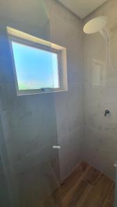 Casa aconchegante 5 minutos da praia a pé Cozy house 5 minutes from the beach on foot