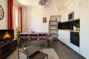 Centre ville - cosy appartement - sous les parapluies