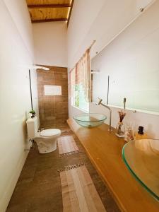 Falésia House Cumuruxatiba - pé na areia