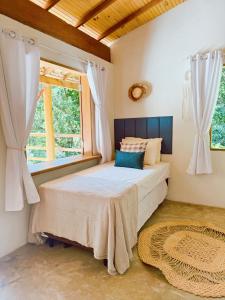 Falésia House Cumuruxatiba - pé na areia