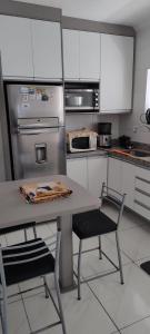 Apartamento pé na areia