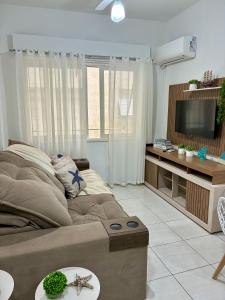 Pé na areia Embaré Santos