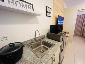 1 BR Wind Residences condo