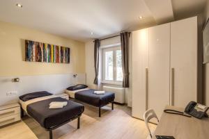 Doppel- oder Zweibettzimmer
