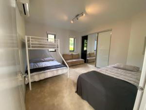 Modern Beach Escape 4BR Walk to Beach