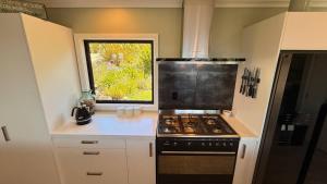 Golden Bay Heights - Luxury Accommodation