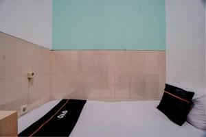 OYO 95035 Harmony Guest House Syariah Sawojajar