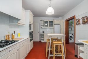 Moradia Milú frente à praia