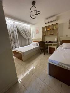 Central Apartment with Wide Garden View by mohamed