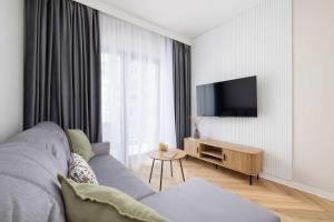 Stylish Apartment in a Modern Development 800 m from Spodek by Noclegi Renters