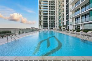 Golden Stays - Fully Equipped 1BR Apartment I Pool & Gym I JVC Dubai
