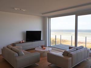 Le Zilt Appartement rénové deux chambres vue mer et dune avec parking privé à La Panne by La Conciergerie
