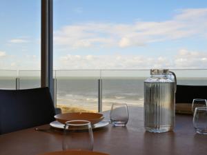 Le Zilt Appartement rénové deux chambres vue mer et dune avec parking privé à La Panne by La Conciergerie