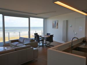 Le Zilt Appartement rénové deux chambres vue mer et dune avec parking privé à La Panne by La Conciergerie