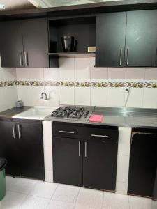 Casa amplia cerca del cc Titan Plaza