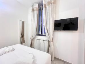LA CASA ROSA AL MARE RAPALLO, Central Seafront Stay, Air Conditioning, Wi-Fi, the Ideal Choice for a Relaxing and Exciting Coastal Escape, with available on request at 20,00 euro per night Private Garage, Welcome kit Priority with Prosecco