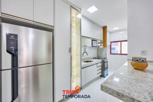 Apartamento espaçoso com ar condicionado e Wi-fi, a 100 metros da praia - Edifício Estoril