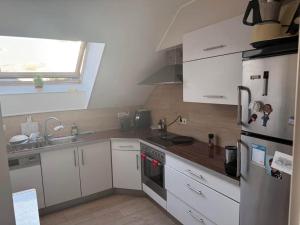 Room with king size bed and Bathroom at a shared appartment