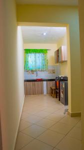 Sunlit Serenity- Cozy 1Br Coastal retreat in Diani