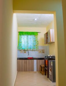 Sunlit Serenity- Cozy 1Br Coastal retreat in Diani