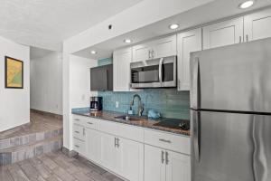 Beach Cove Resort Unit 717 with Direct Oceanfront Balcony