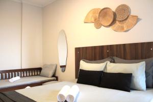 2 Quartos com Varanda sendo 1 Suíte, Cozinha completa, Vista Mar - Condomínio Frente Mar, Lazer completo com Piscina coberta e aquecida, Estacionamento, Portaria 24h - Apto indicado para Grupos, Famílias e Hóspedes a Trabalho, Praia da Guilhermin