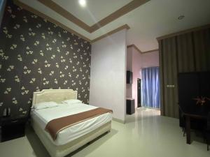 Hotel O near Universitas Palangka Raya formerly Wisma Aries