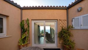 Villa Nettuno panoramic pool villa with patio above the sea