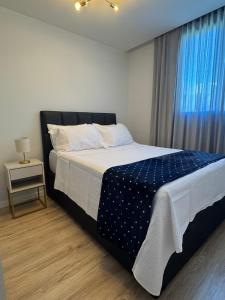 Bluetique Stays Modern 2BR Stay Near Beach & Shopping