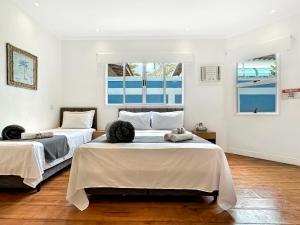 Pousada 50m da Praia 2 Suítes com Ar-Condicionado Cozinha Privativa Piscina