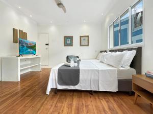 Pousada 50m da Praia 2 Suítes com Ar-Condicionado Cozinha Privativa Piscina