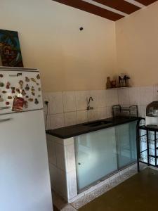 Casa com piscina no centro da serra do cipó