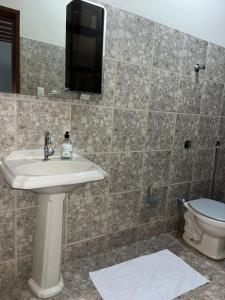 Casa com piscina no centro da serra do cipó