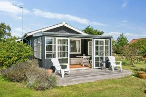 Traditional Black And White House Near Dråby Beach