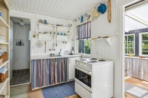 Traditional Black And White House Near Dråby Beach