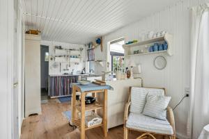 Traditional Black And White House Near Dråby Beach