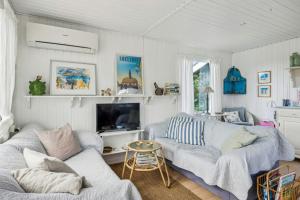 Traditional Black And White House Near Dråby Beach