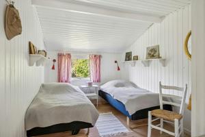 Traditional Black And White House Near Dråby Beach